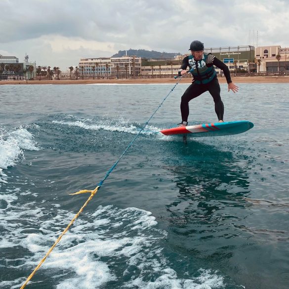 Wingfoil lessons: towed from a boat